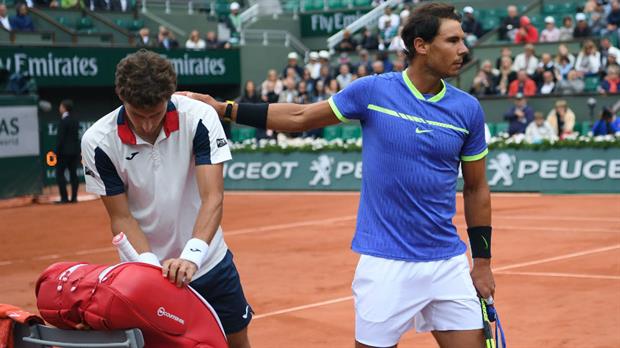 Rafa Nadal consuela a Carreño Busta